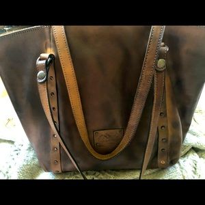 Patricia Nash tote distressed grey-missing one stud otherwise perfect condition